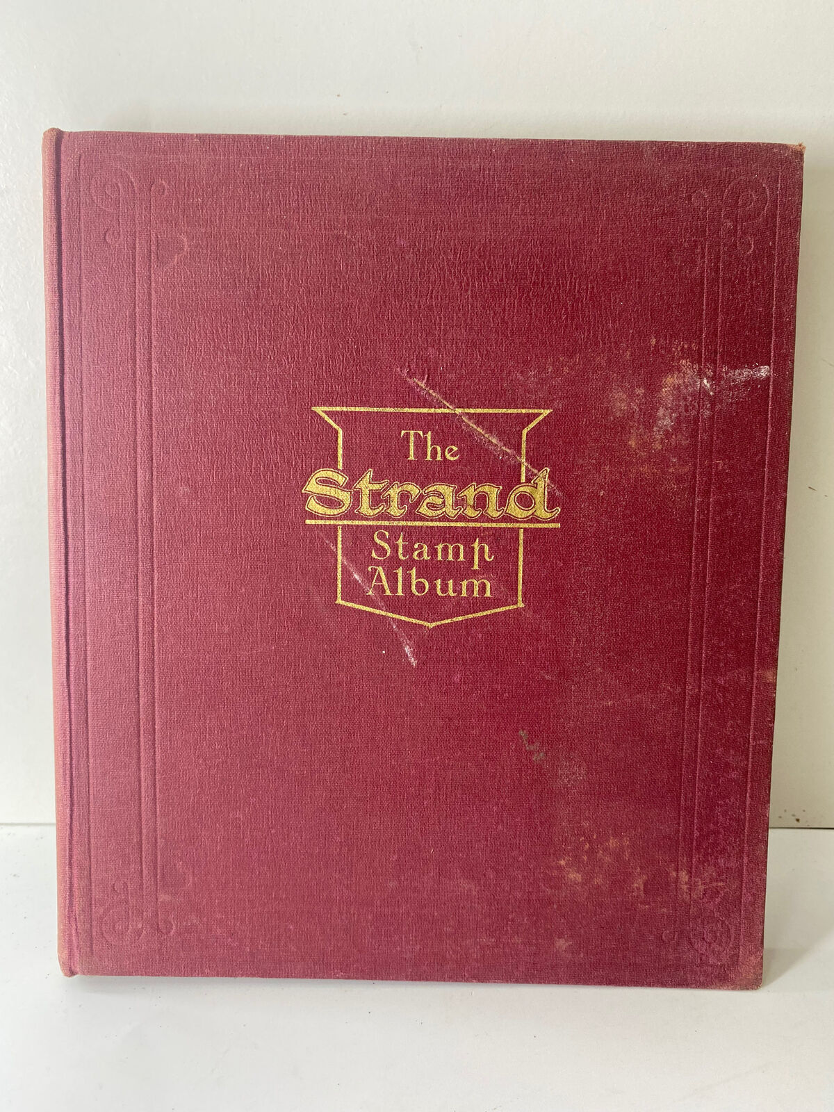 The Strand Stamp Album for The Postage Stamps of the World with Stamp Collection