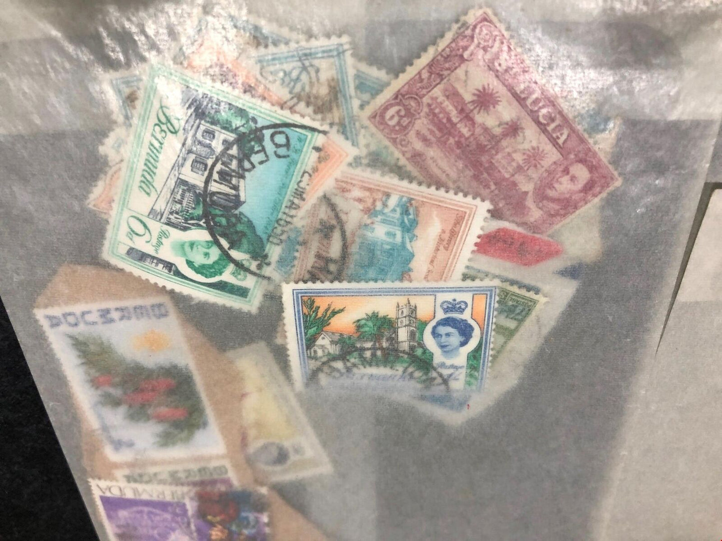Collection Of Stamps From Hong Kong, Kenya, Uganda, Cayman Islands, St. Lucia