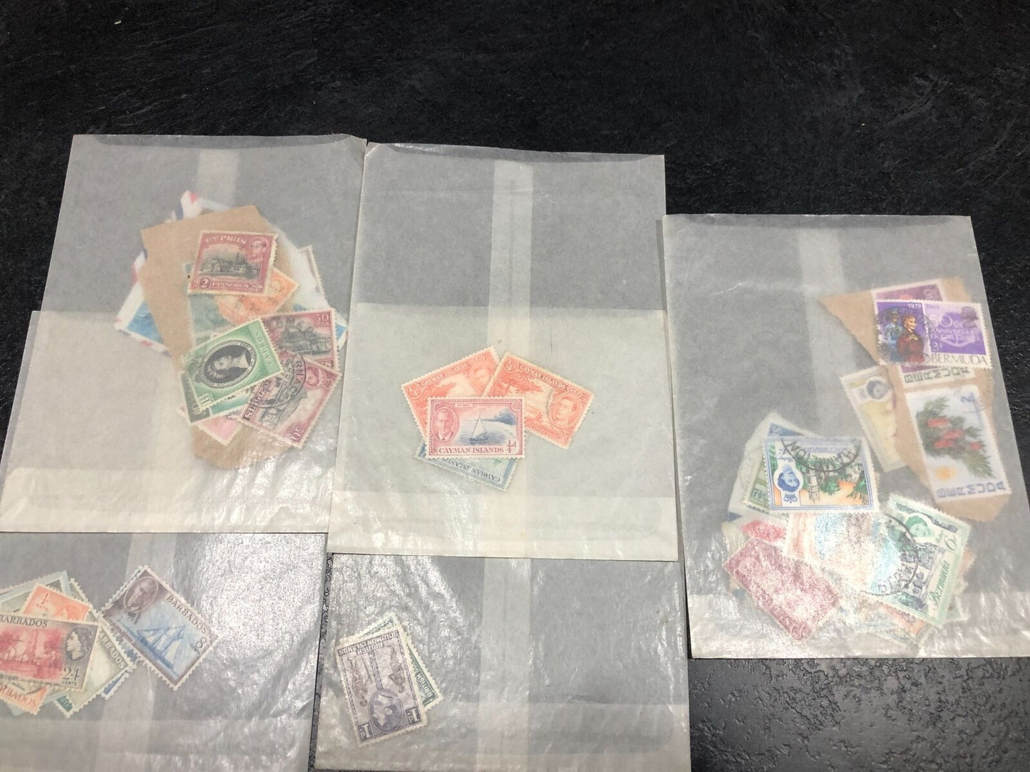 Collection Of Stamps From Hong Kong, Kenya, Uganda, Cayman Islands, St. Lucia