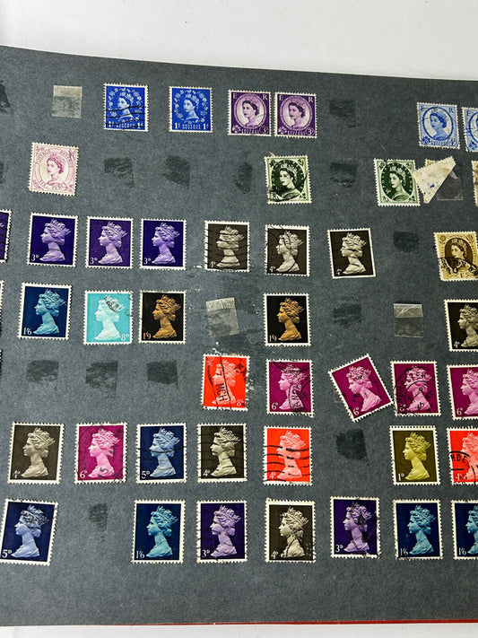 Small Collection of Vintage British Postage Stamps in Red Album