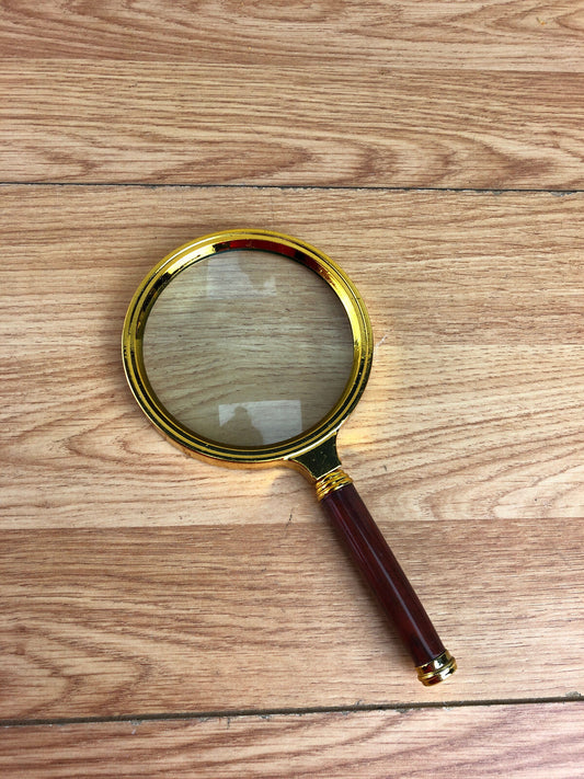 Plastic Wood Effect And Gold Coloured Magnifying Glass