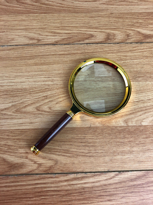 Plastic Wood Effect And Gold Coloured Magnifying Glass